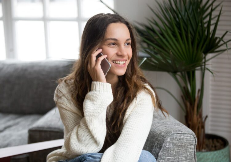 Woman smiling on the phone